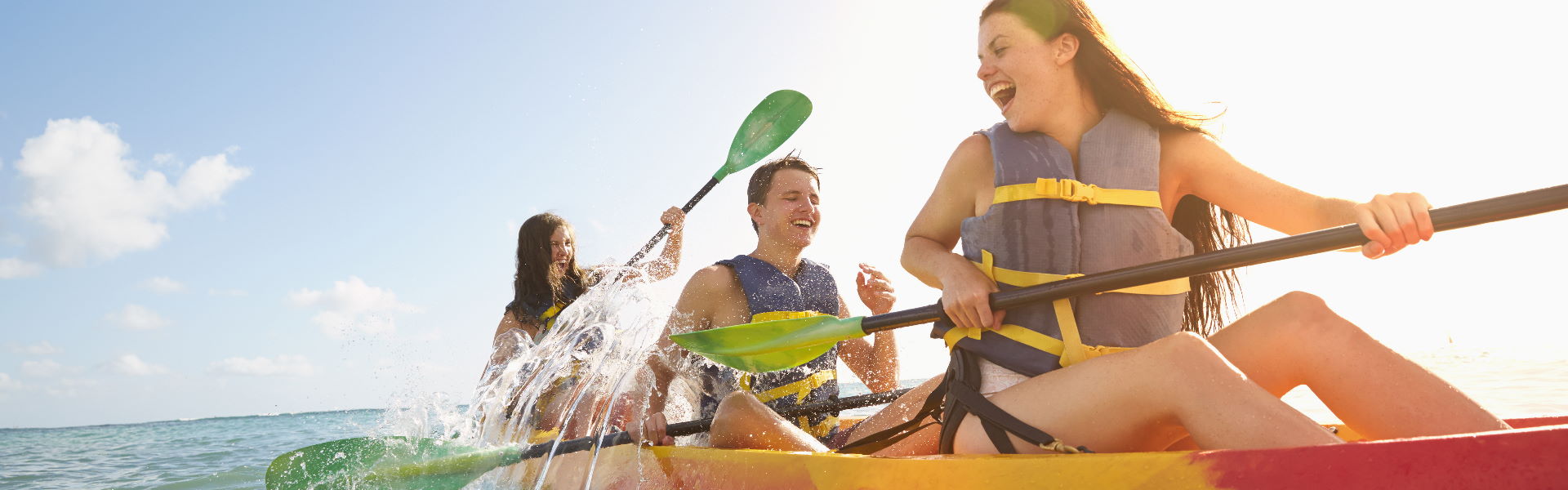 Image showing three people in a kayak